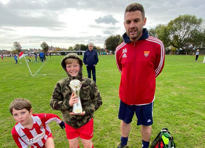 Man of the match Ned with coach Dave Ablitt